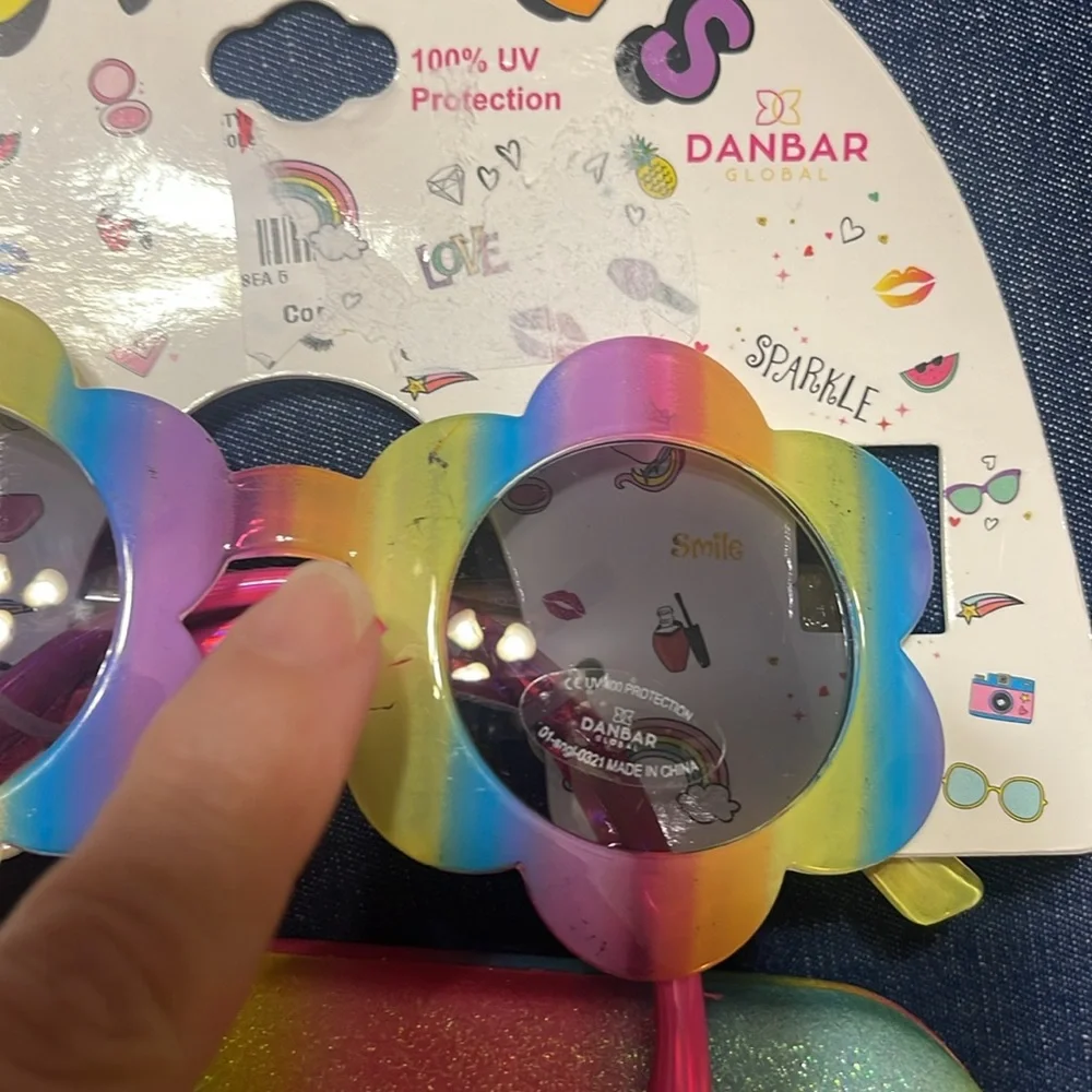 Sunglasses and case. Little girl. Few scratches on the frame. See pictures